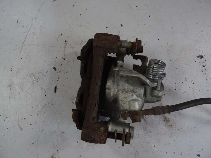 Toyota Corolla E11 Zacisk Hamulcowy Lewy Tylny - obrazek 4