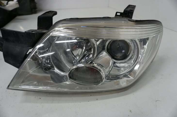 Mitsubishi Outlander I Lift Lampa Lewa Przednia - obrazek 2