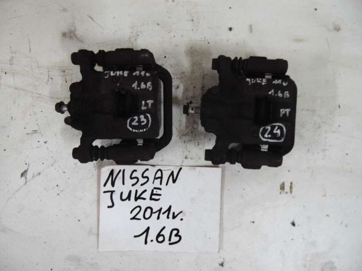 Nissan Juke F15 Zacisk Hamulcowy Tylny 1.6b