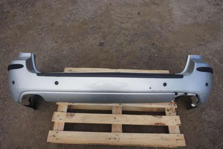 SUBARU LEGACY IV ZDERZAK TYLNY 57704AG070 SREBRNY