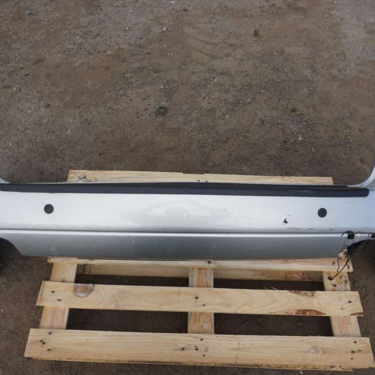 SUBARU LEGACY IV ZDERZAK TYLNY 57704AG070 SREBRNY
