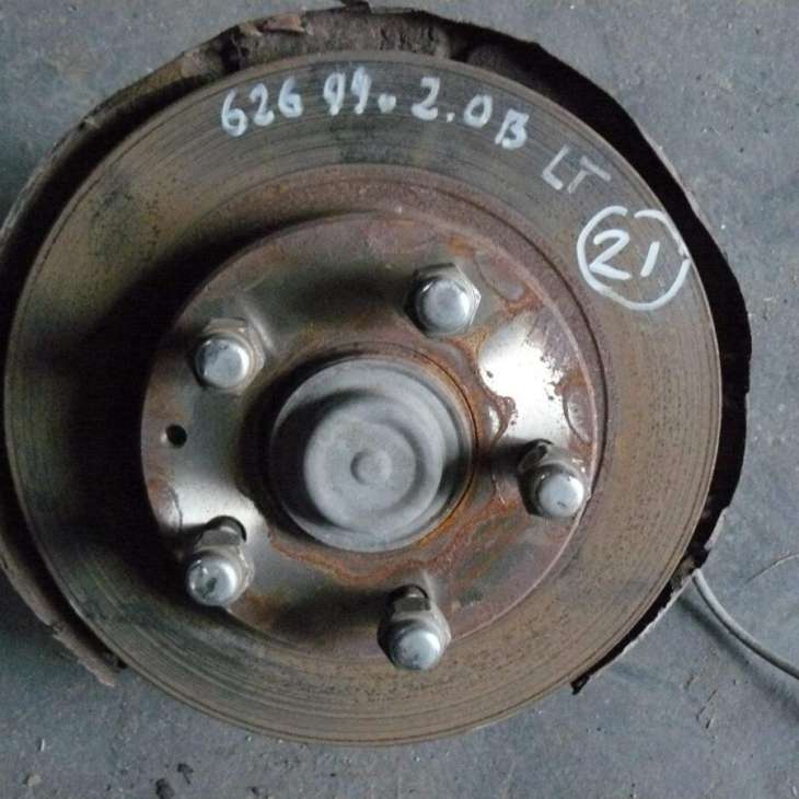 Mazda 626 1999 2000r Zwrotnica Piasta Lewy Tył