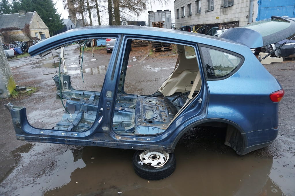 Subaru Tribeca B9 LEWY BŁOTNIK PRÓG SŁUPEK KOLOR 64Z