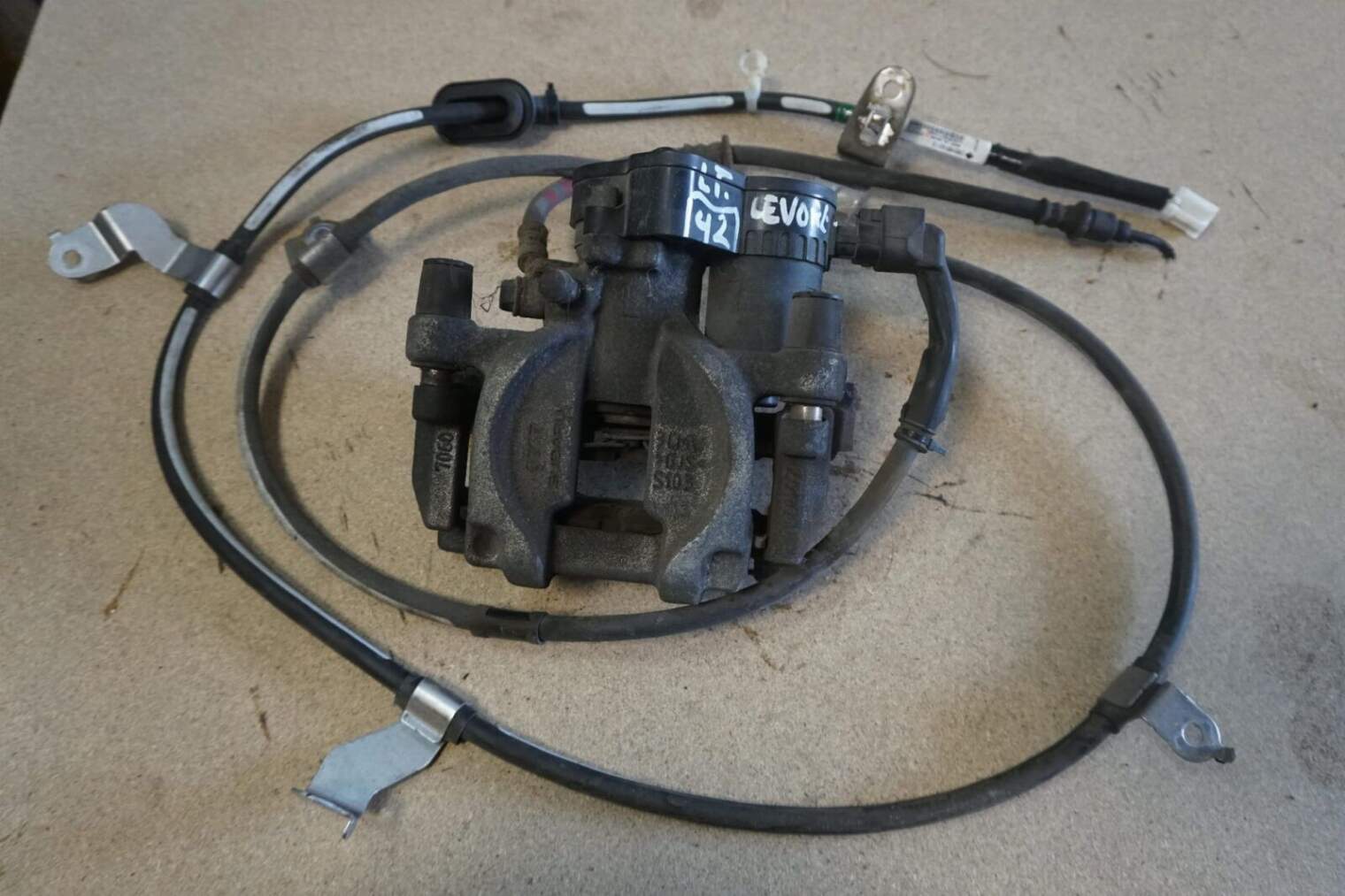 SUBARU LEVORG ZACISK TYLNY LEWY LINKA HAMULCOWA 26620AL030 26018VA010