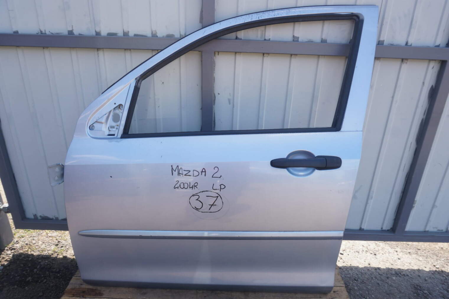 MAZDA 2 DY DRZWI LEWE PRZEDNIE 2004rok