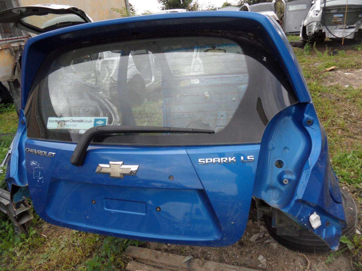 Chevrolet Spark M300 2010r Szyba Klapa Bagażnika